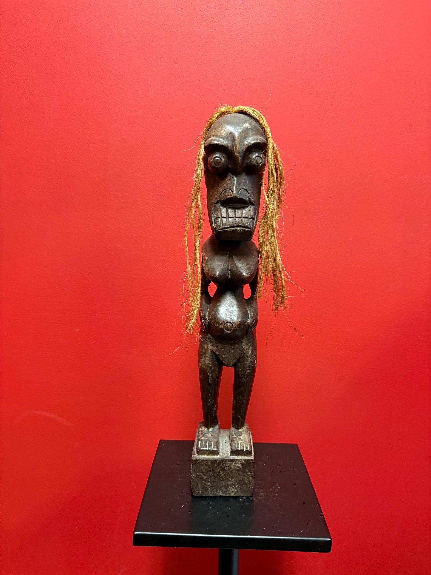 Beautiful antique 16 inch tall African statue with unique hair great condition and value