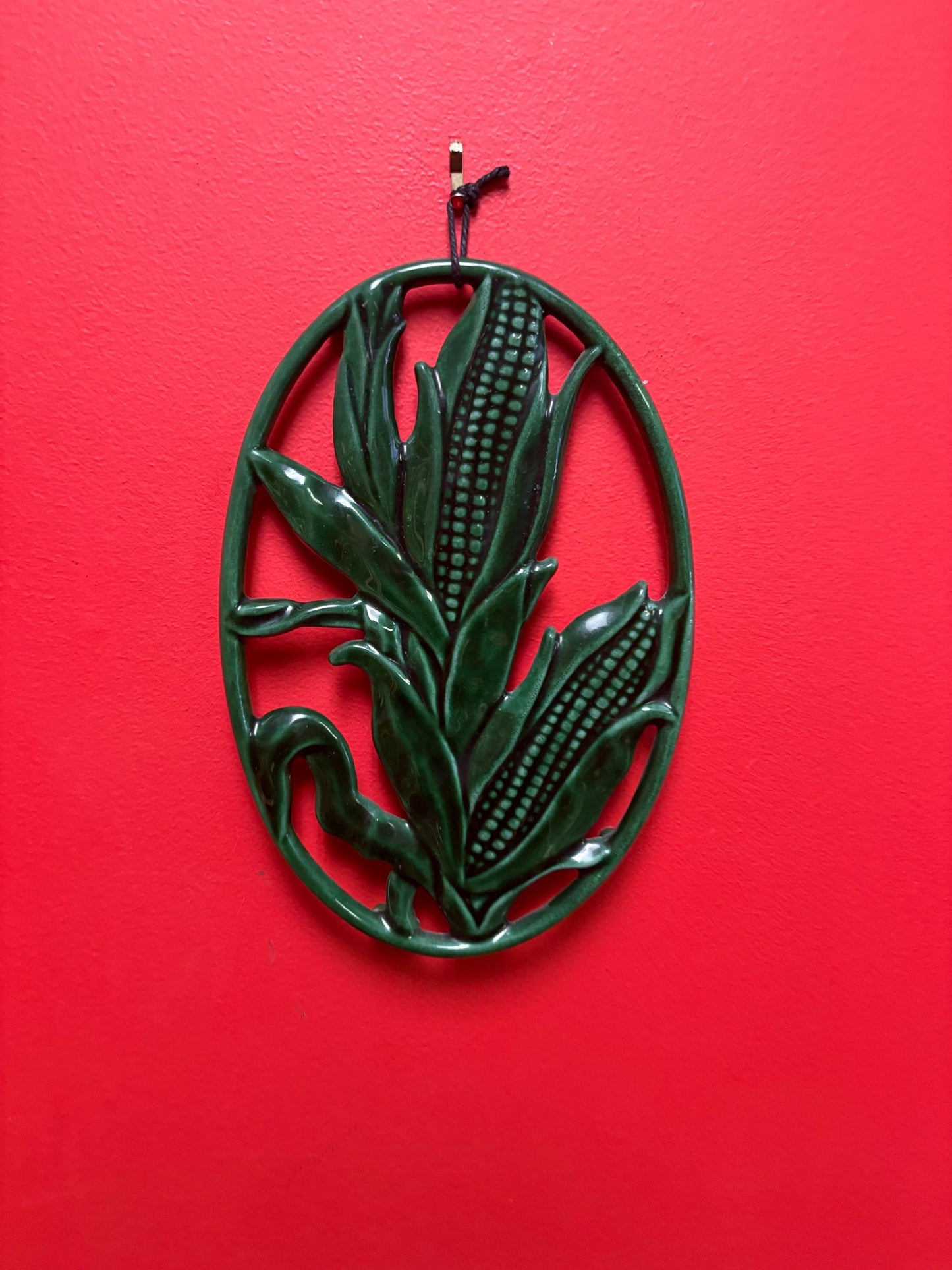 Beautiful French 11 x 8 wide antique INVICTA metal enamelled corn shaped trivet  also hangs  very cool gift