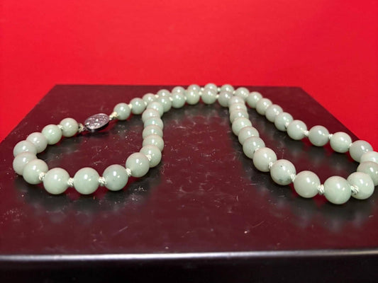 Vintage Chinese high-quality jade bead necklace with sterling silver clasp   approximately 25 inches great knotting  wonderful gift
