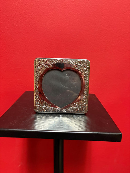 Lovely 4 inch silver plated  heart shaped photograph frame two available and price is  for each great condition and perfect gift