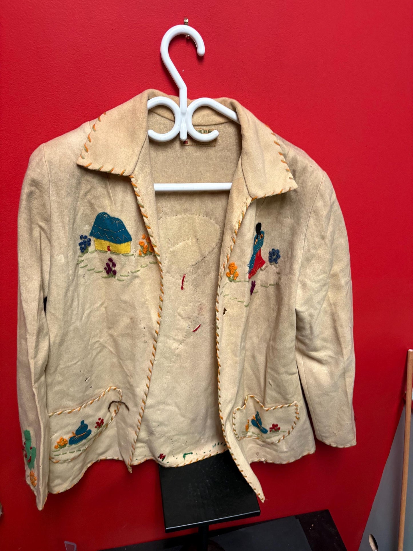 Beautiful antique Mexican leather and woven  jacket 30 inch tall and 16 inch across chest approximately  some tiny holes