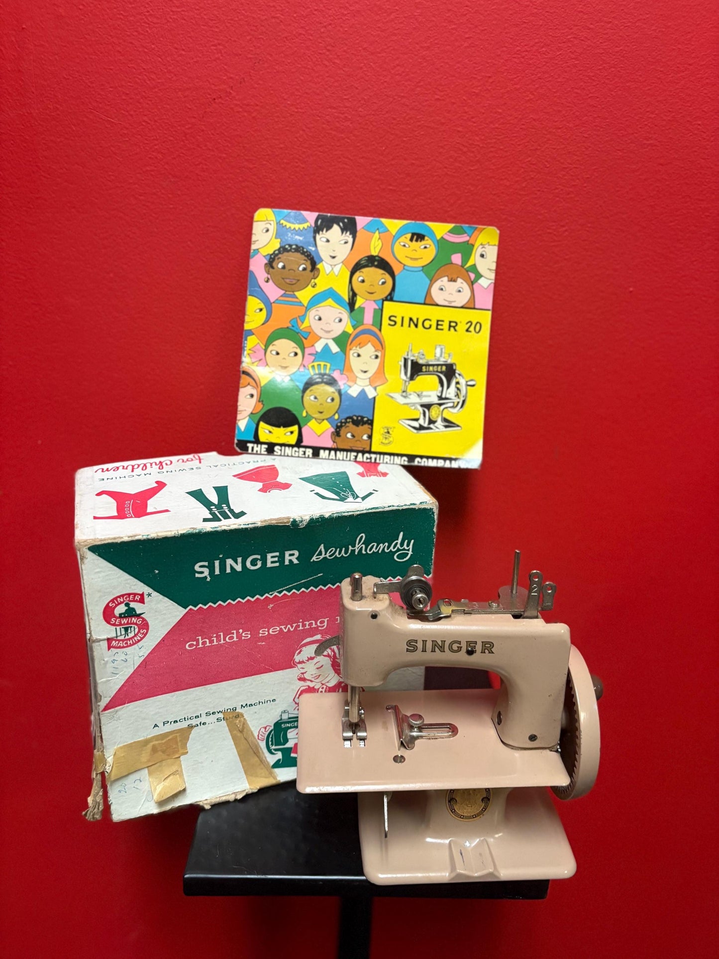 Amazing vintage like new rare singer sew handy children sewing machine  seems to work  great colour with instructions and box