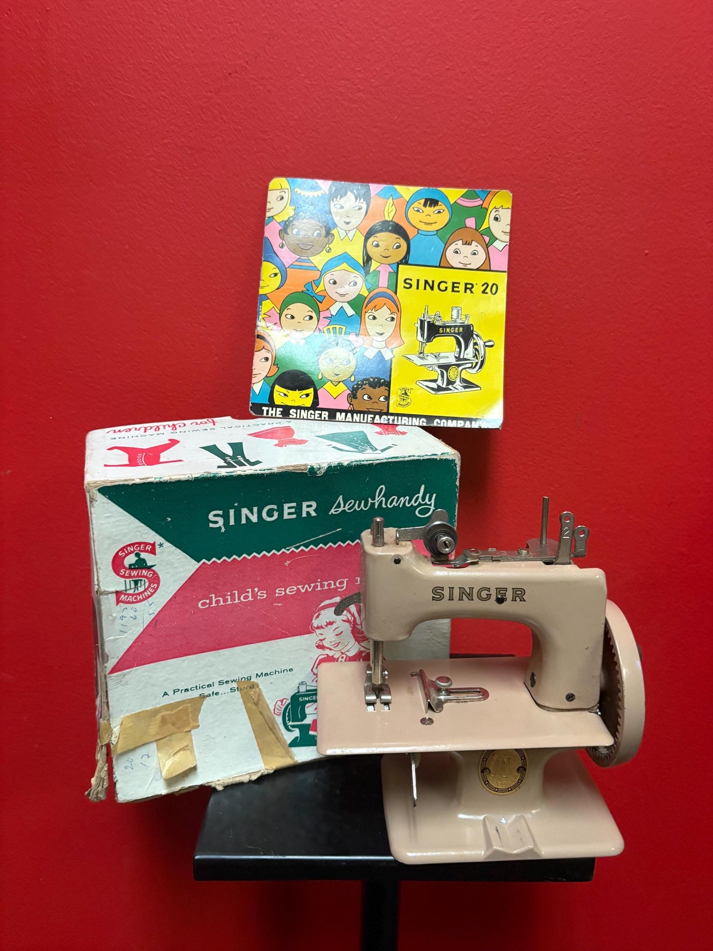 Amazing vintage like new rare singer sew handy children sewing machine  seems to work  great colour with instructions and box