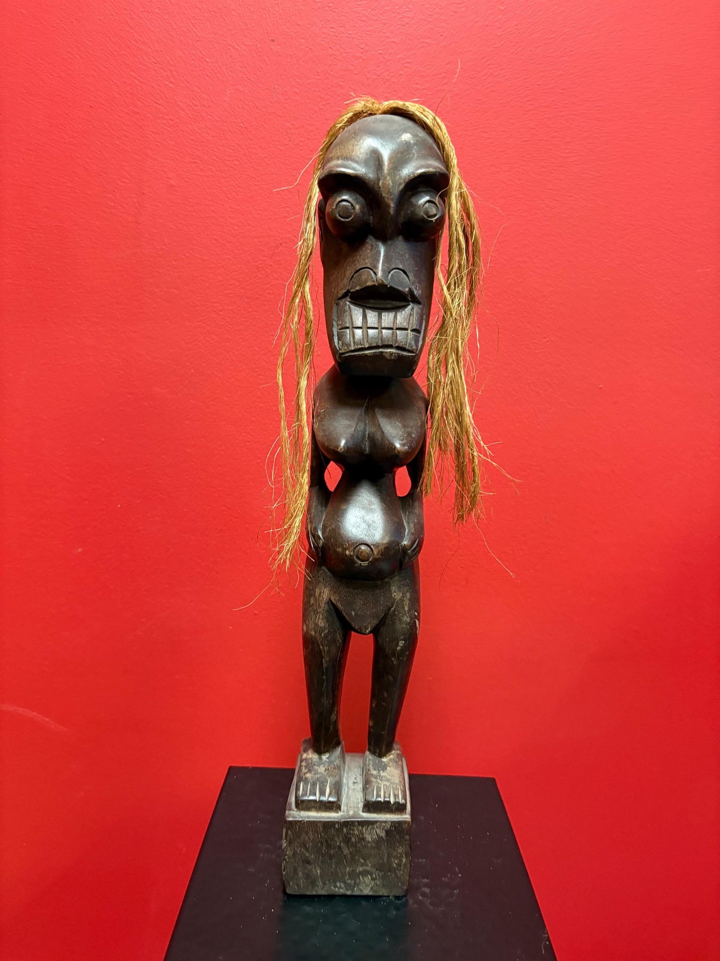 Beautiful antique 16 inch tall African statue with unique hair great condition and value