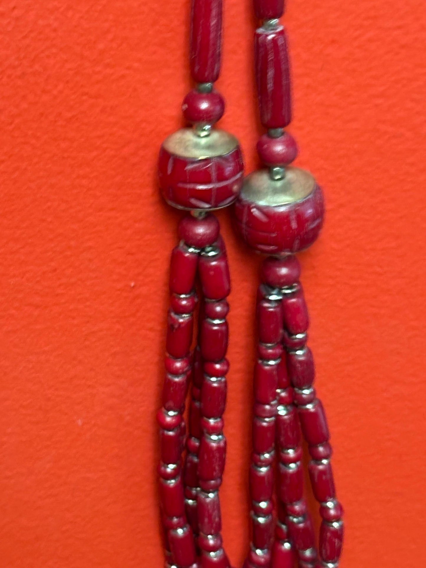 Approximately 22 inch long carved stone and metal necklace  very unusual and great value