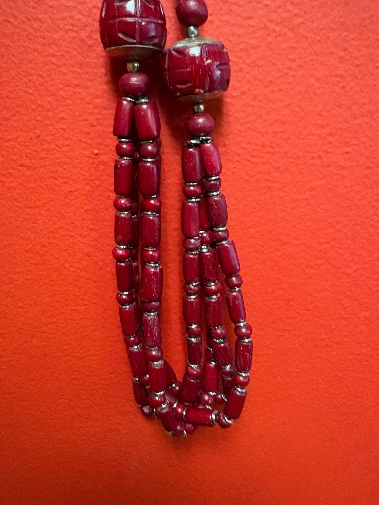 Approximately 22 inch long carved stone and metal necklace  very unusual and great value