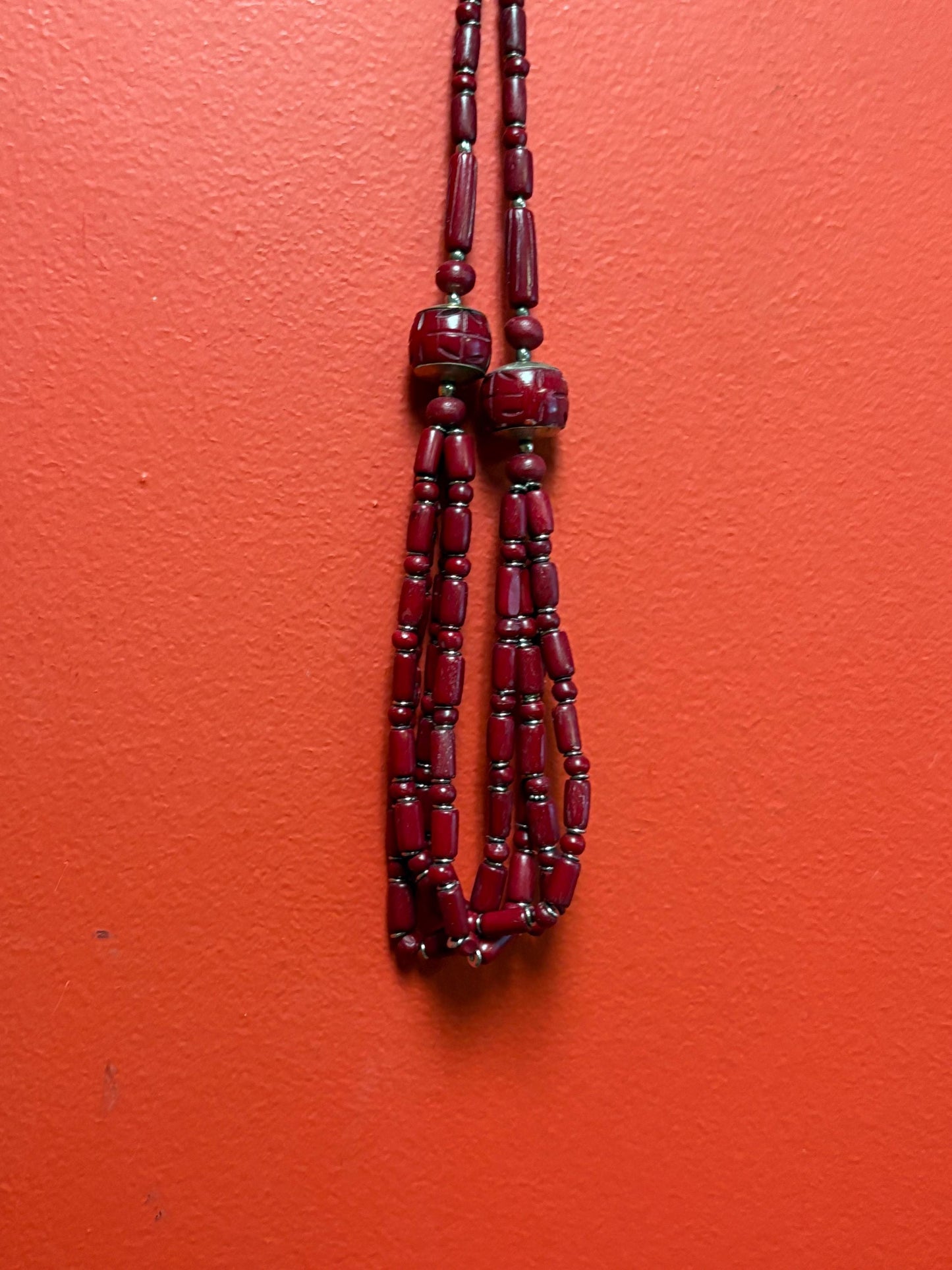 Approximately 22 inch long carved stone and metal necklace  very unusual and great value