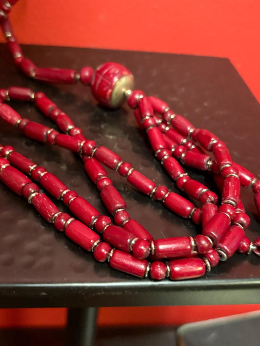 Approximately 22 inch long carved stone and metal necklace  very unusual and great value