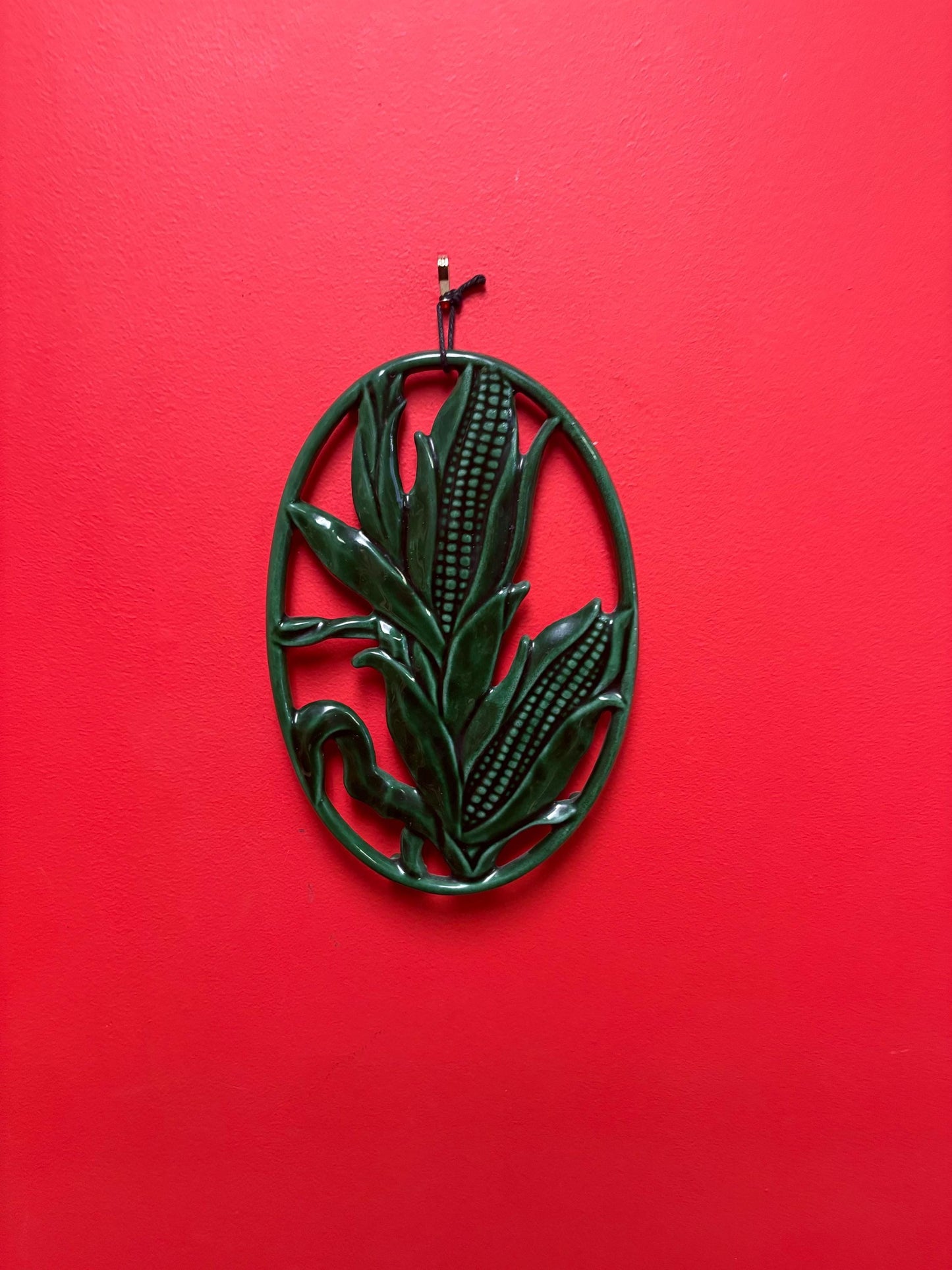 Beautiful French 11 x 8 wide antique INVICTA metal enamelled corn shaped trivet  also hangs  very cool gift