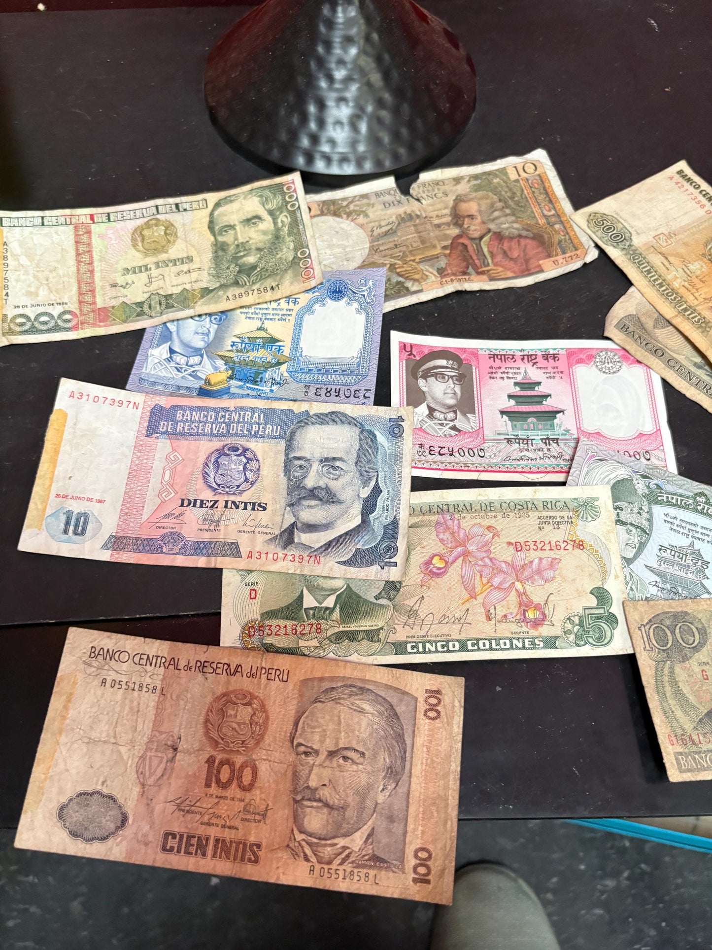 Pile of vintage international bank notes   get rich quick