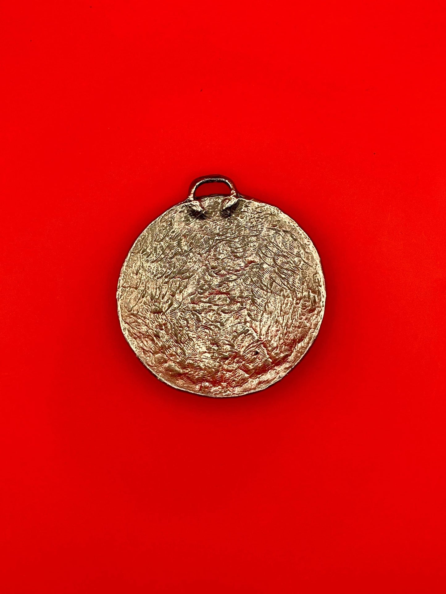 Round Hammered Metal Pendant with blue beads and Scroll Design