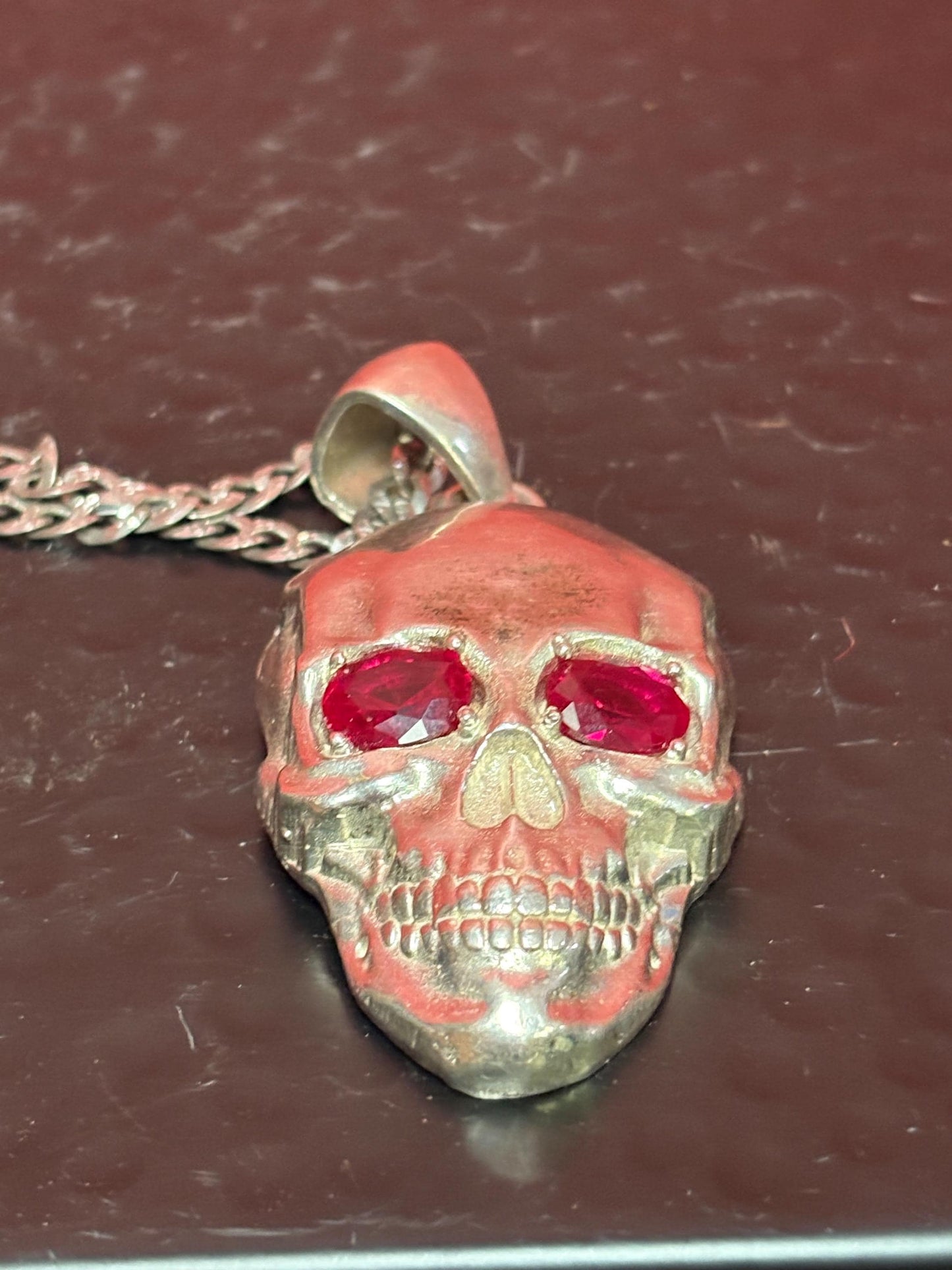 Super amazing heavy stamped 925 Sterling silver 3 inch skull pendant with Ruby style eyes and approximately 23 inch long sterling necklace -