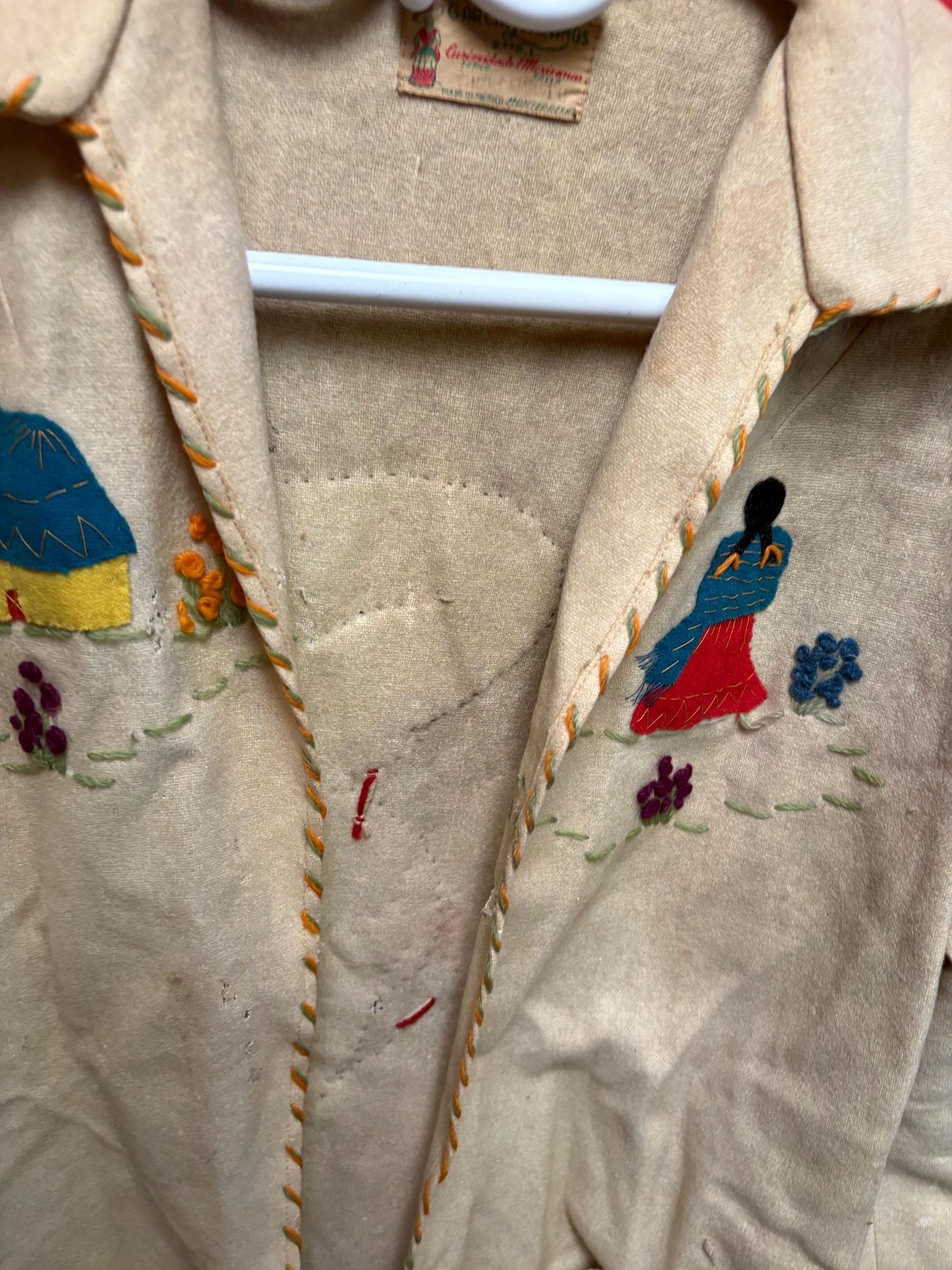 Beautiful antique Mexican leather and woven  jacket 30 inch tall and 16 inch across chest approximately  some tiny holes