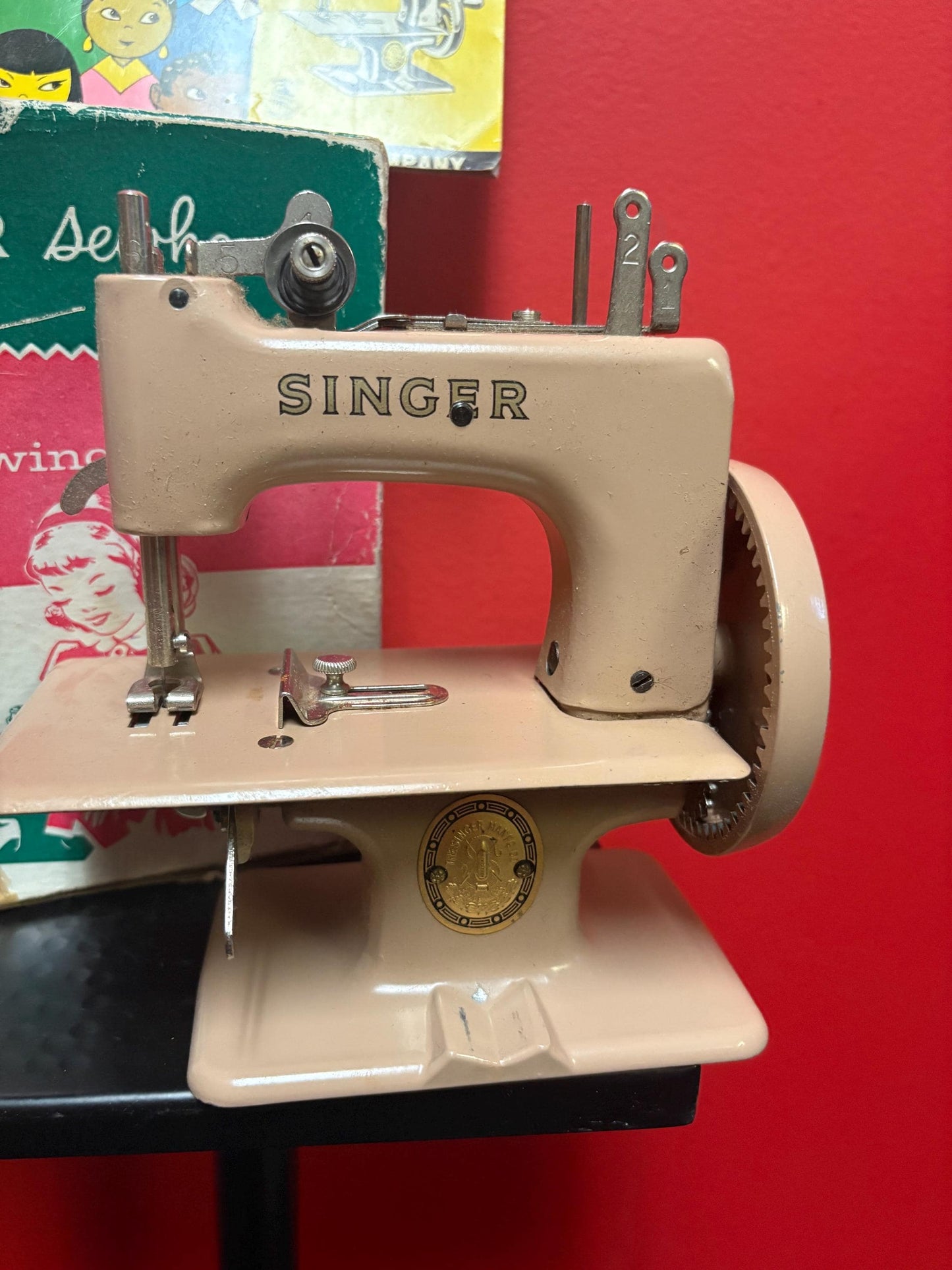 Amazing vintage like new rare singer sew handy children sewing machine  seems to work  great colour with instructions and box