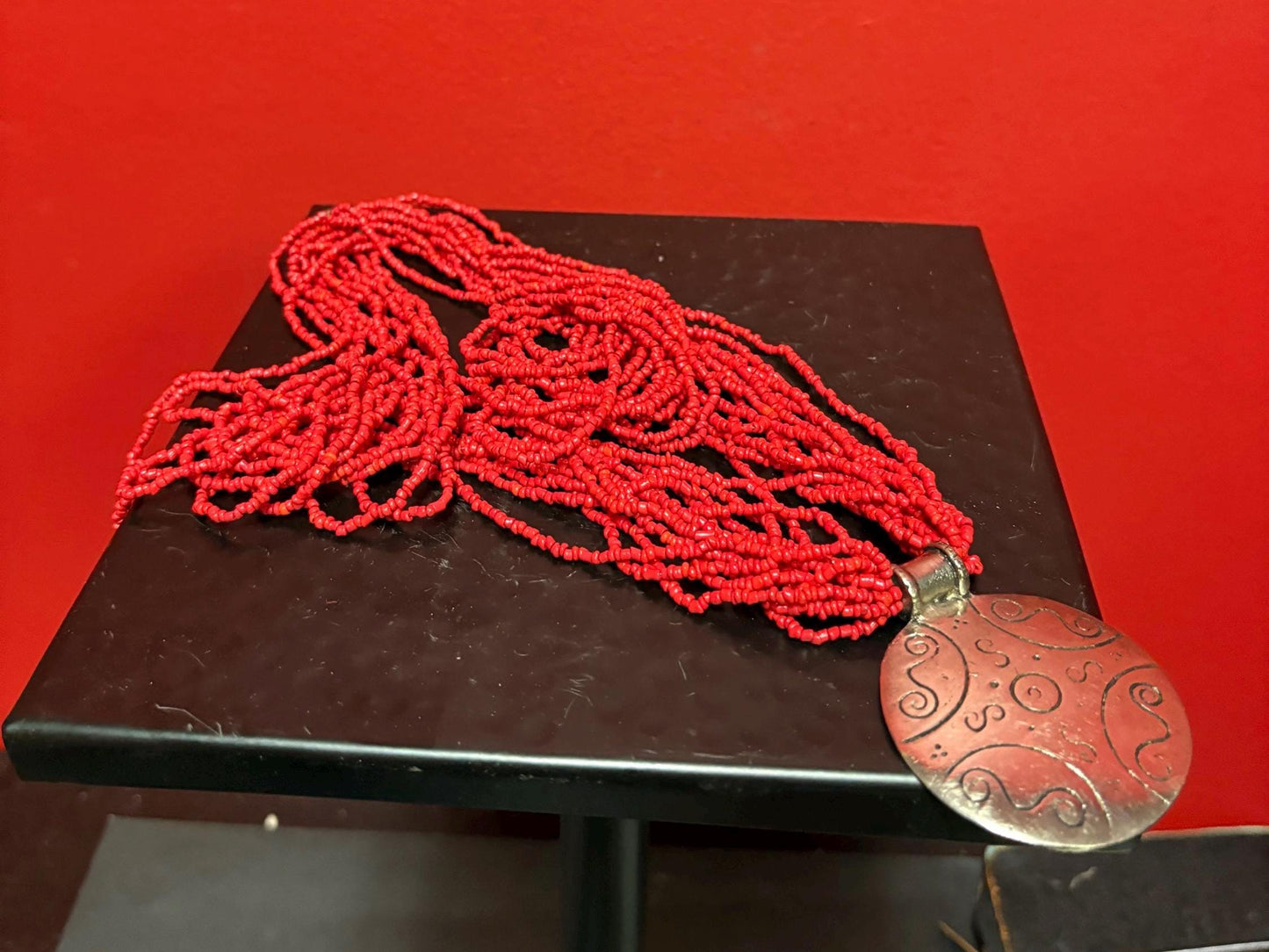 Stunning coral necklace with amazing Arabic style pendant— necklace 25 inches approximately and pendant 2 1/2 inches — great look