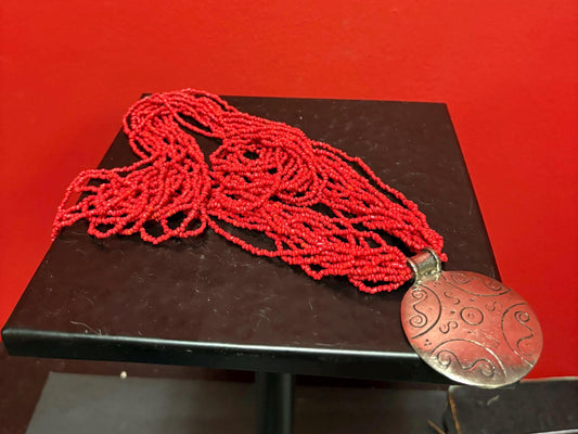 Stunning coral necklace with amazing Arabic style pendant— necklace 25 inches approximately and pendant 2 1/2 inches — great look