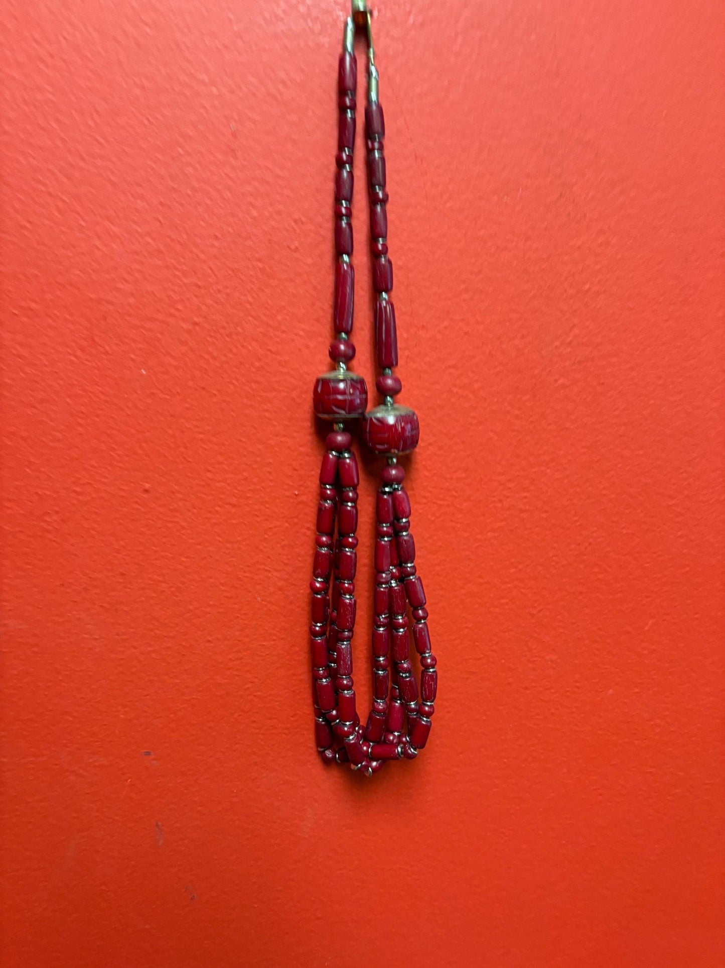 Approximately 22 inch long carved stone and metal necklace  very unusual and great value