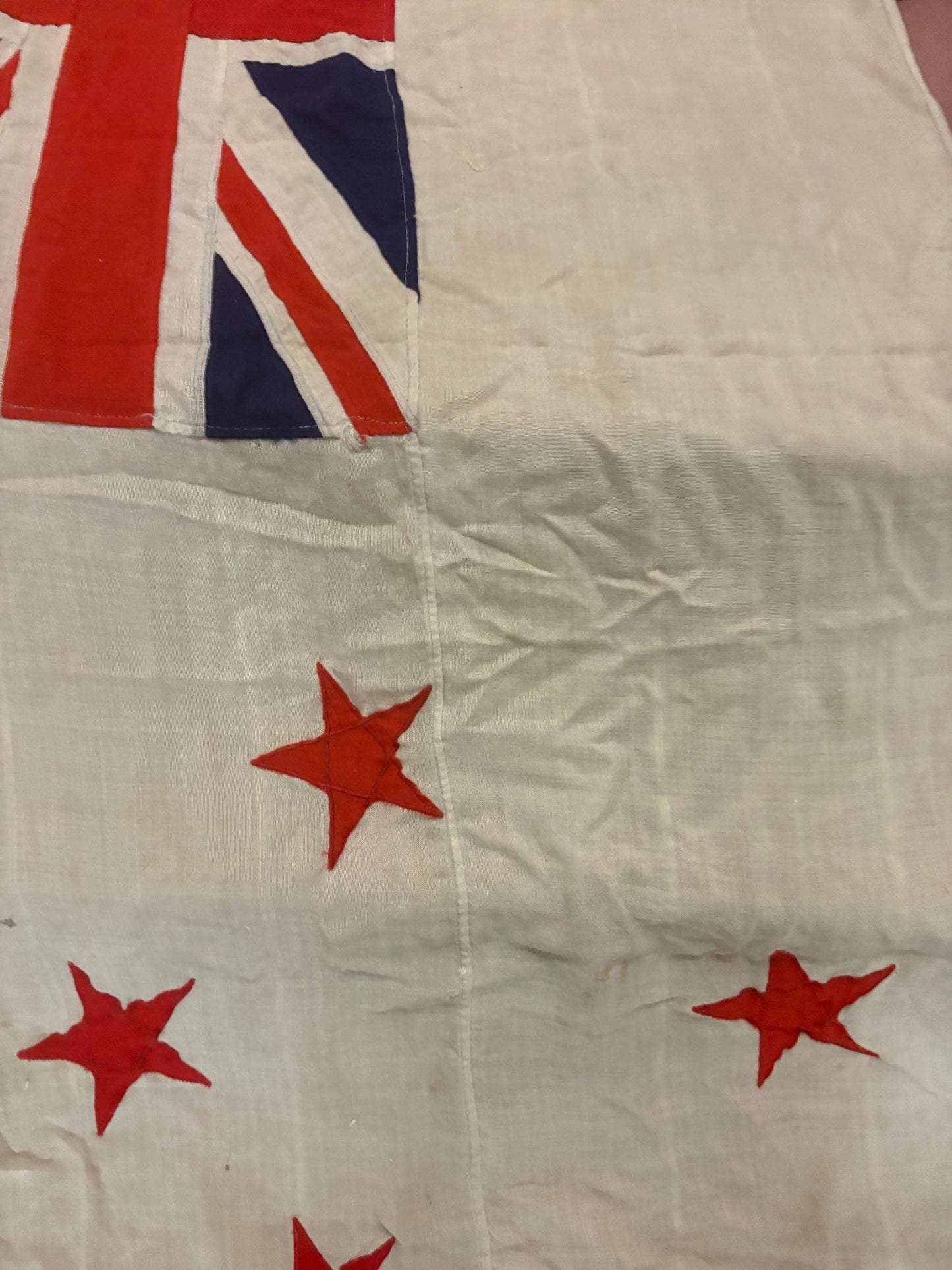 Stunning antique approximately 62 x 30 inch New Zealand flag with hardware  pretty good condition but see photos  great value