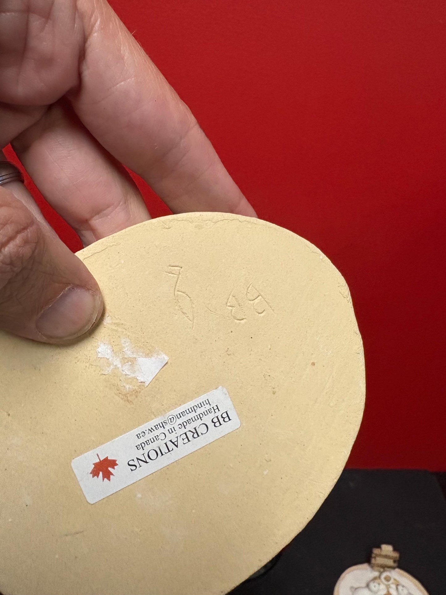 Beautiful indigenous statue of an Eskimo and seals and an Inukshuk  5 x 2 1/2“ high signed  2 available