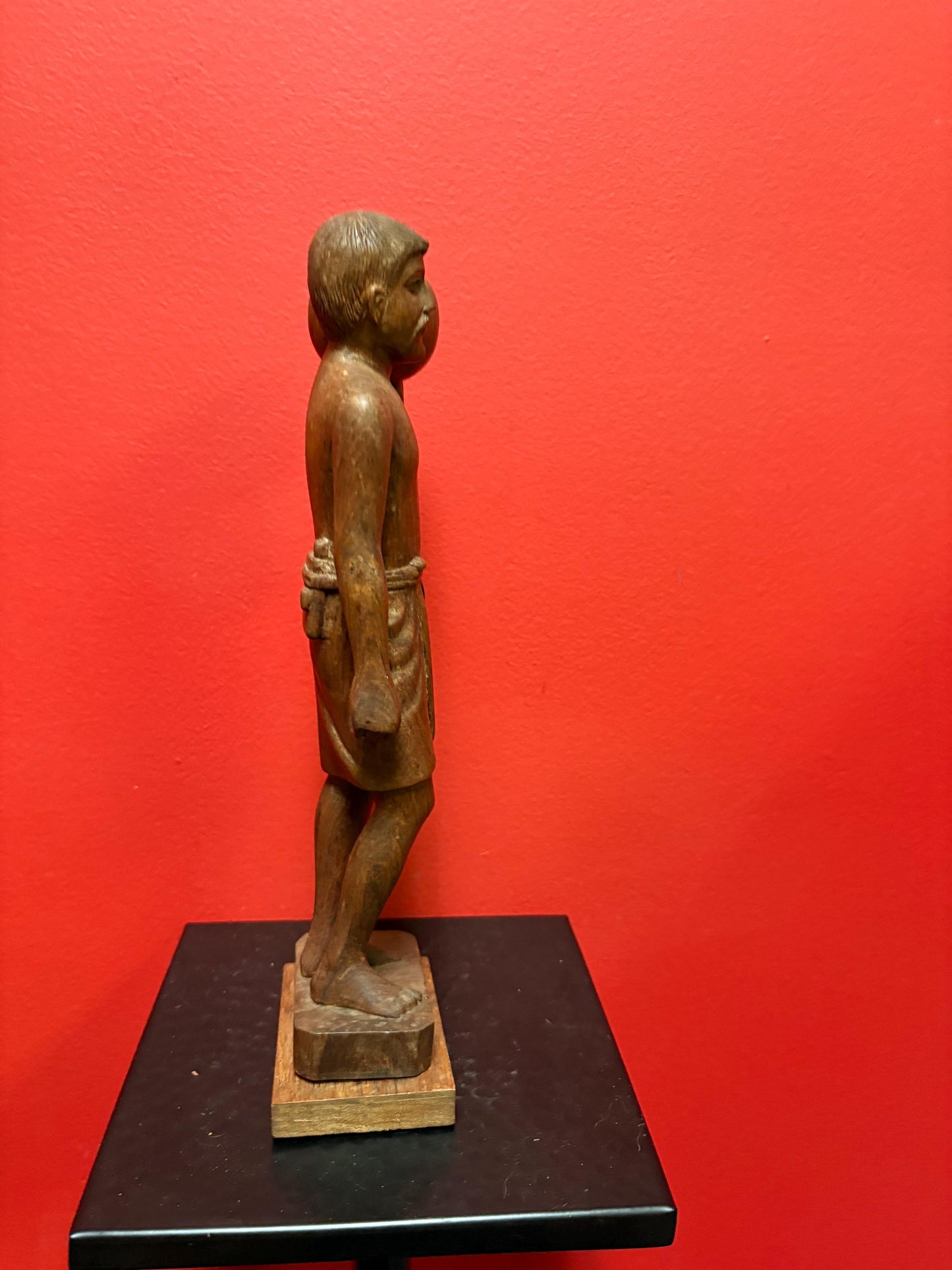 Beautiful wooden signed 1963 Indian statue of a man holding a pot  great detail and fabulous imagery