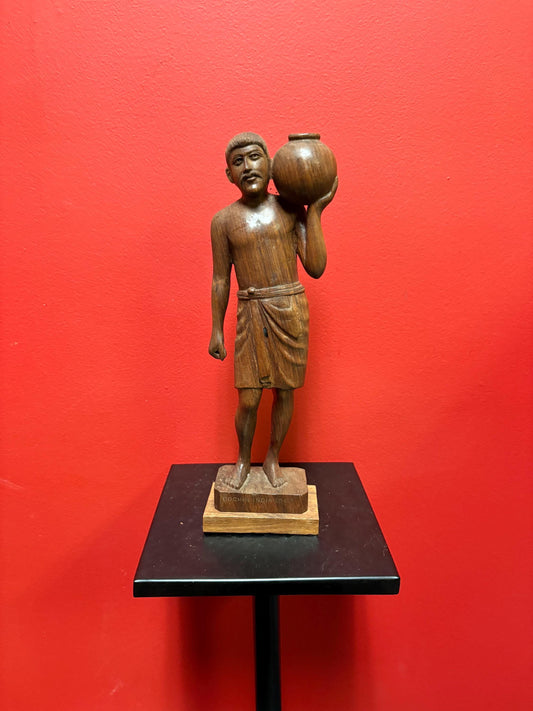 Beautiful wooden signed 1963 Indian statue of a man holding a pot  great detail and fabulous imagery
