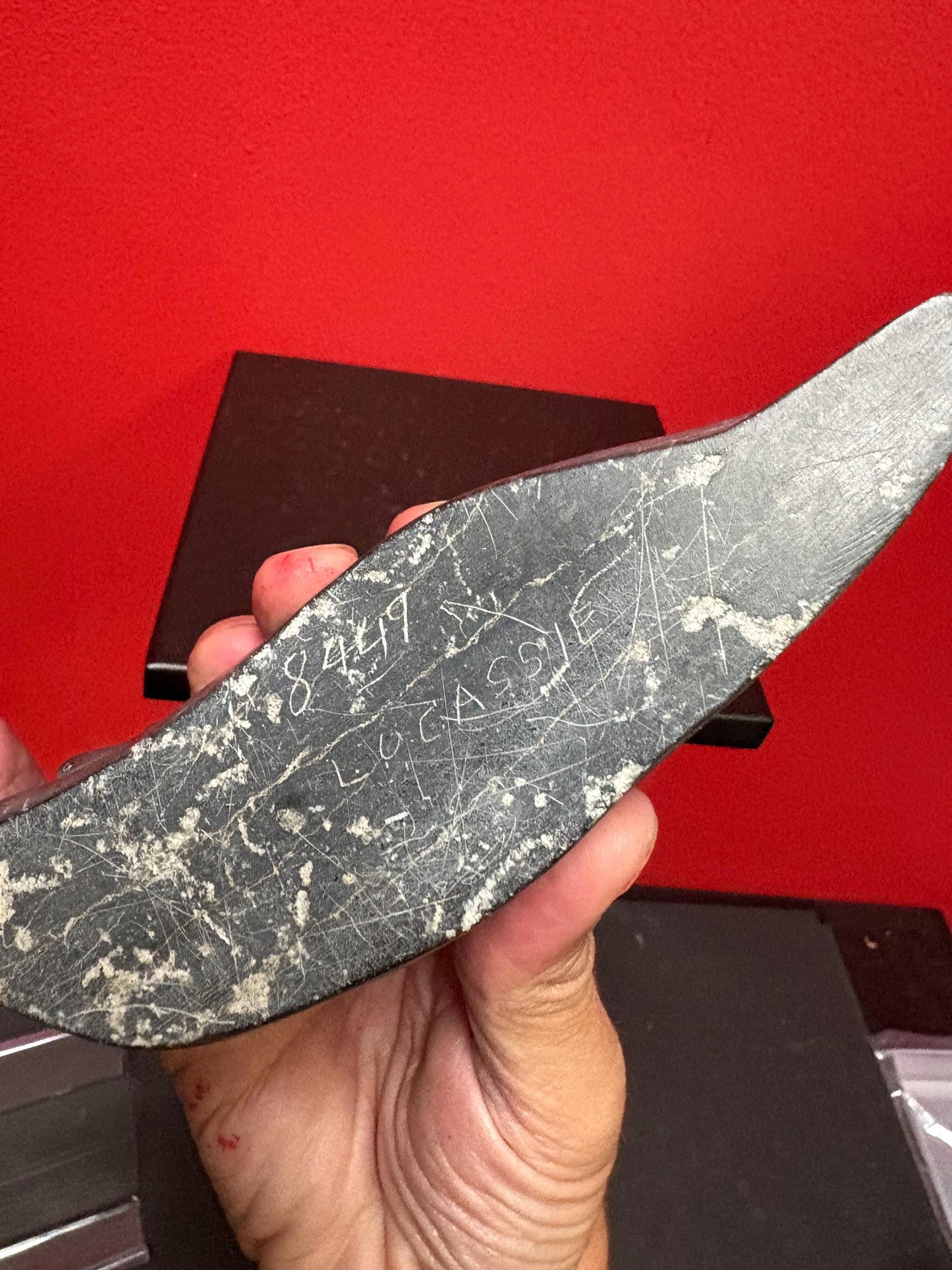 Beautiful old soapstone seal on log with fish in Mouth   7 inches long signed in good condition indigenous Inuit