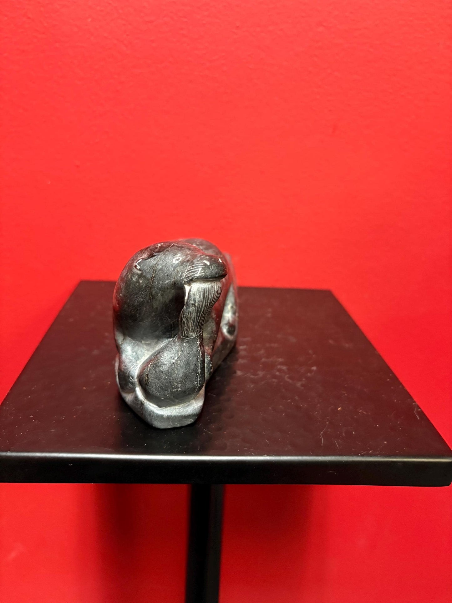 Beautiful old soapstone seal on log with fish in Mouth   7 inches long signed in good condition indigenous Inuit