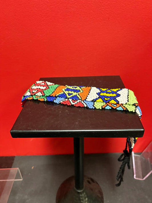 stunning  indigenous and beaded belt in perfect condition approximately 31 inches long - great value and perfect gift