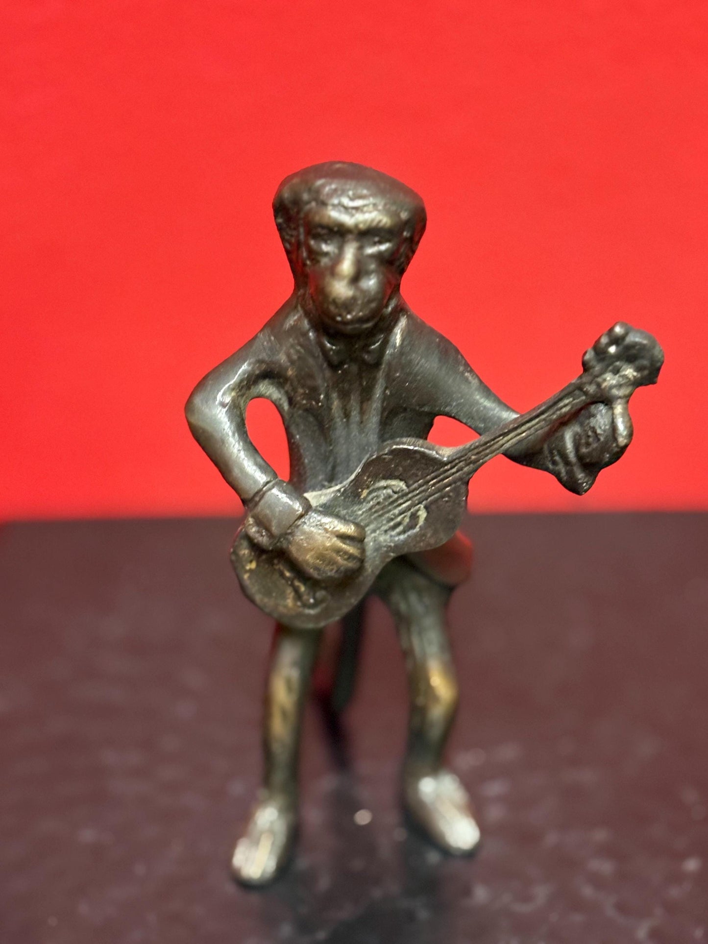 Beautiful antique bronze monkey playing the guitar  great Patina  and 5 inches tall  amazing gift  monkey business