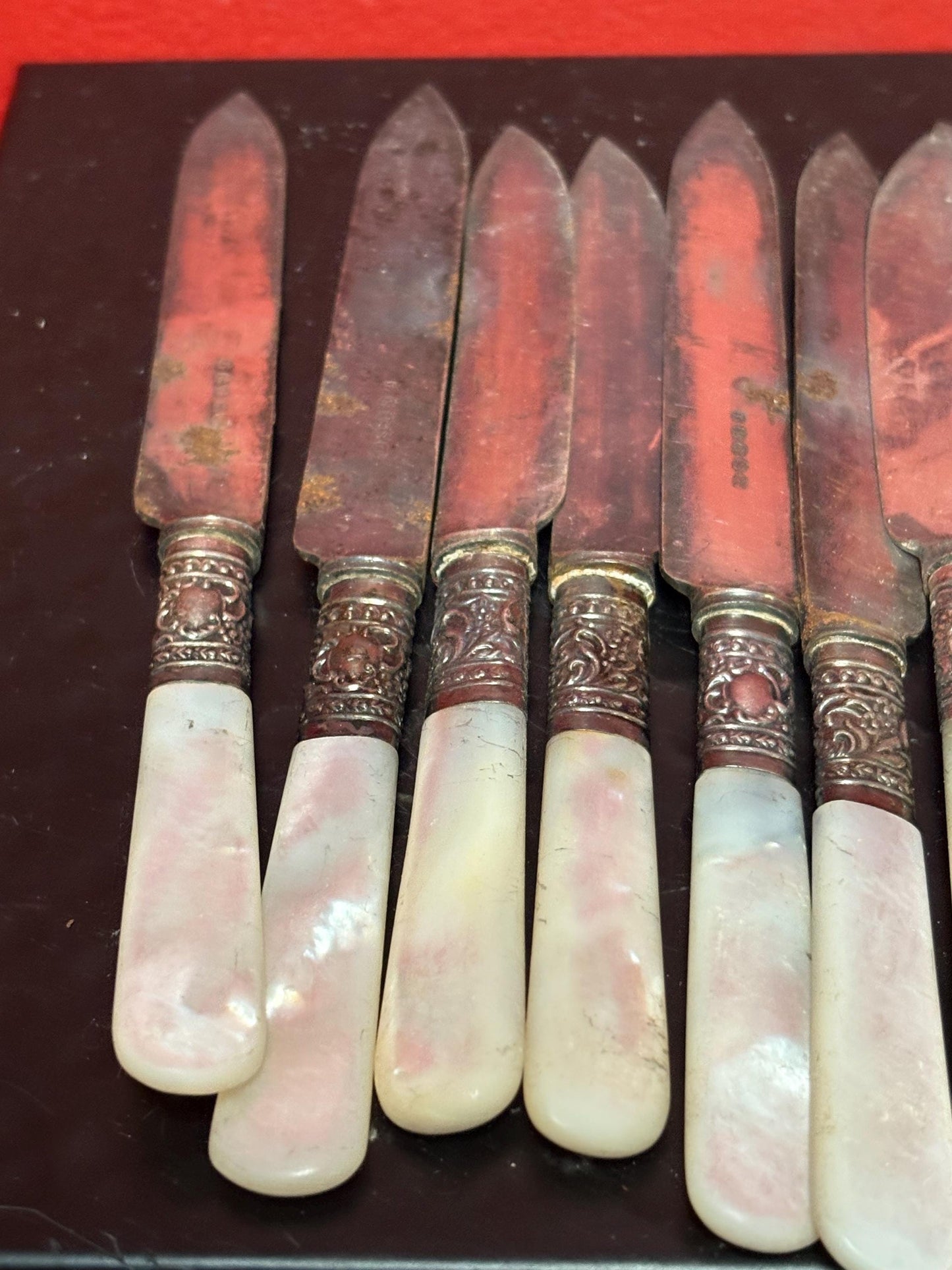 Set 8 antique silver and mother of pearl knives  need a polish  great value