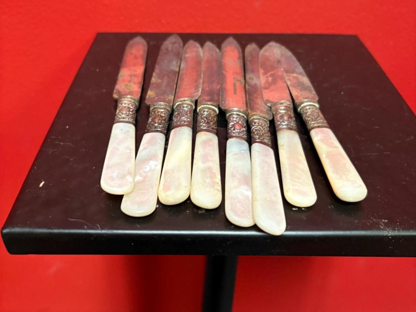 Set 8 antique silver and mother of pearl knives  need a polish  great value