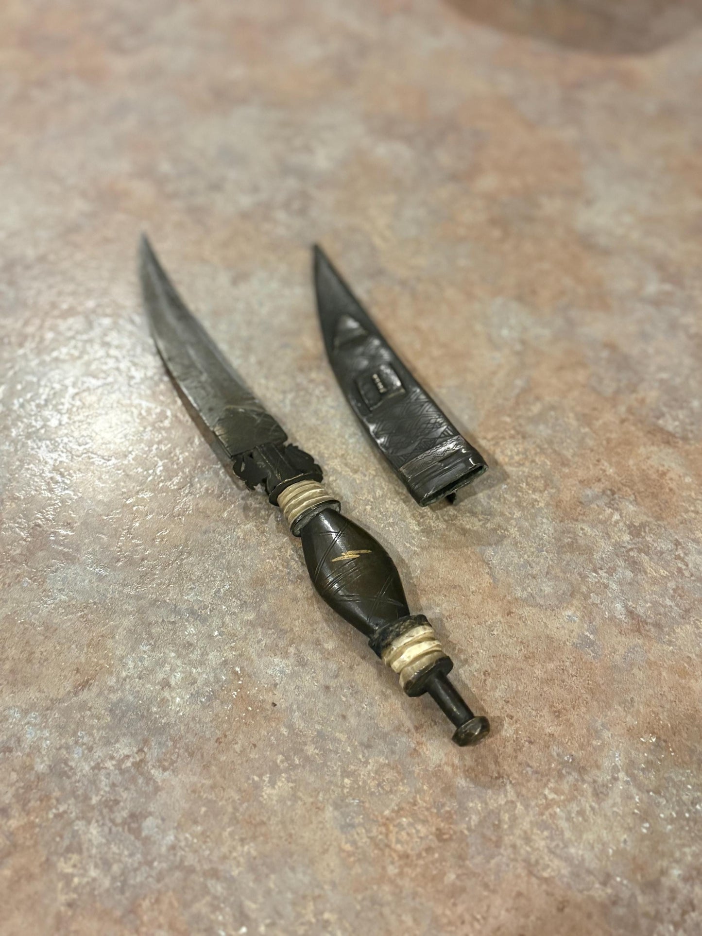 Fabulous museum quality 12 inch early 19 century African bronze steel and horn tribal  knife in sheaf - wonderful patina  great condition