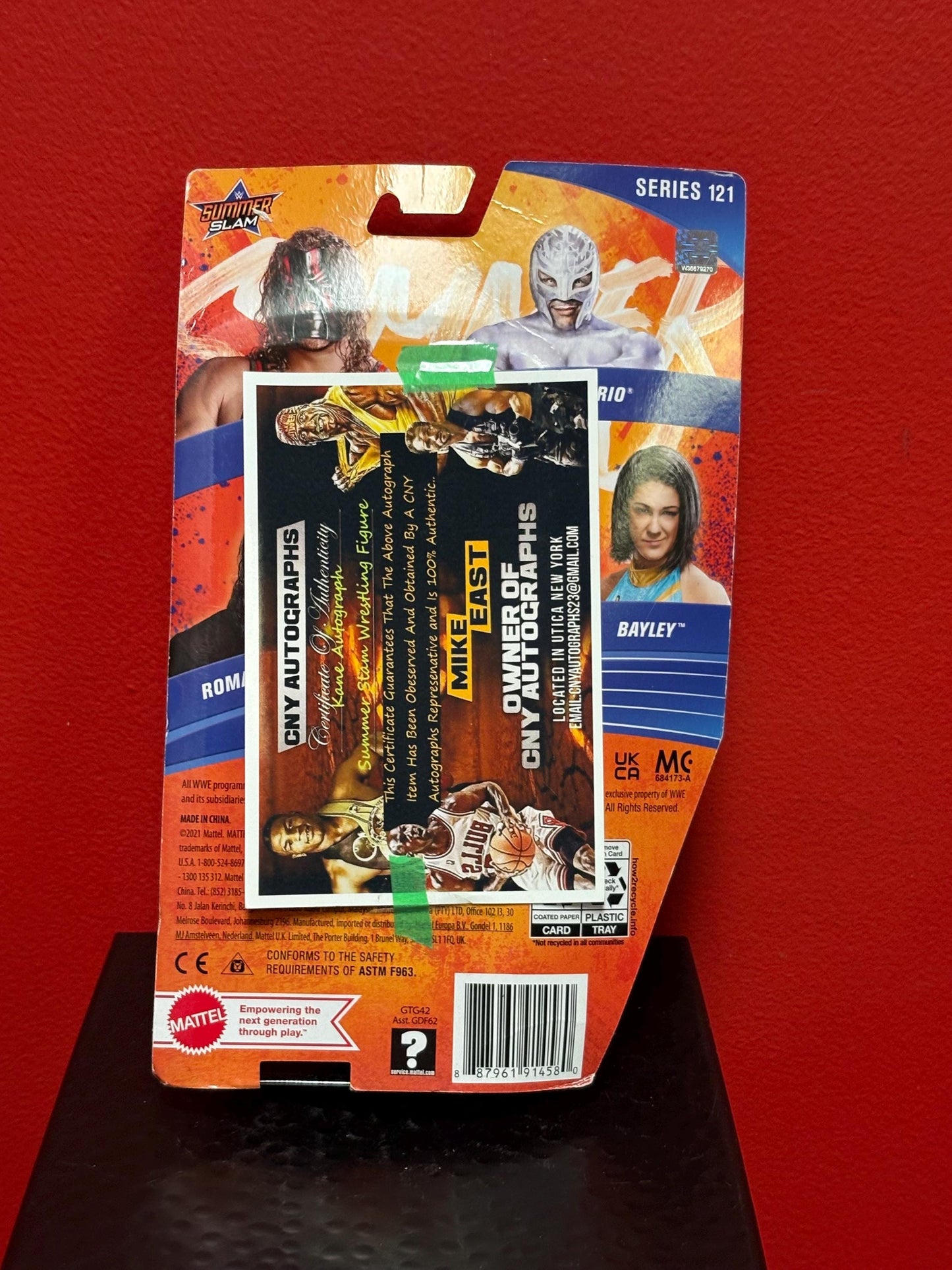 Signed WWE action figure in original packet  Kane   great gift and value - with CAO on back