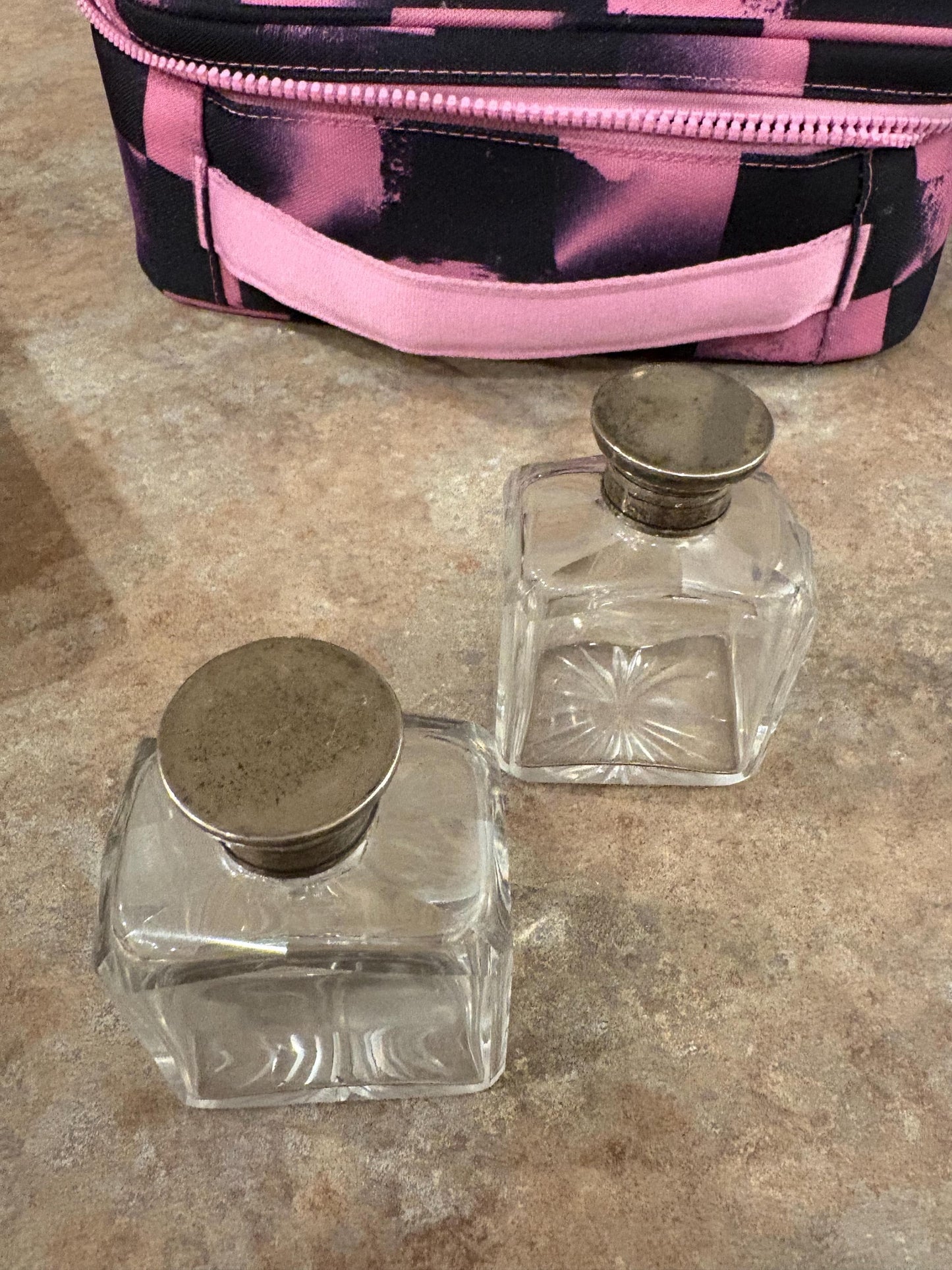 Pair English antique half inch tall untested silver top crystal bottles