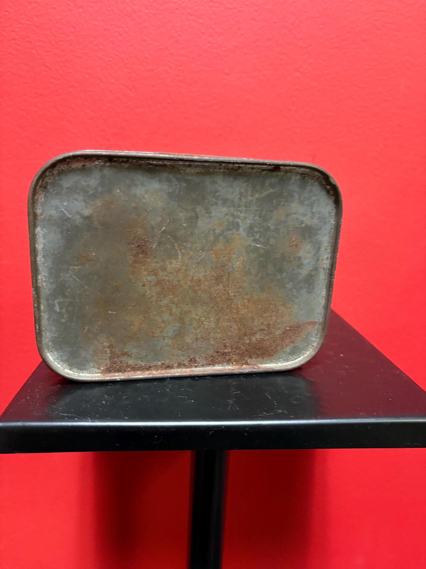 Lovely 5 1/2 x 4 x 1.25 high antique toffee tin with boats scene  old used condition