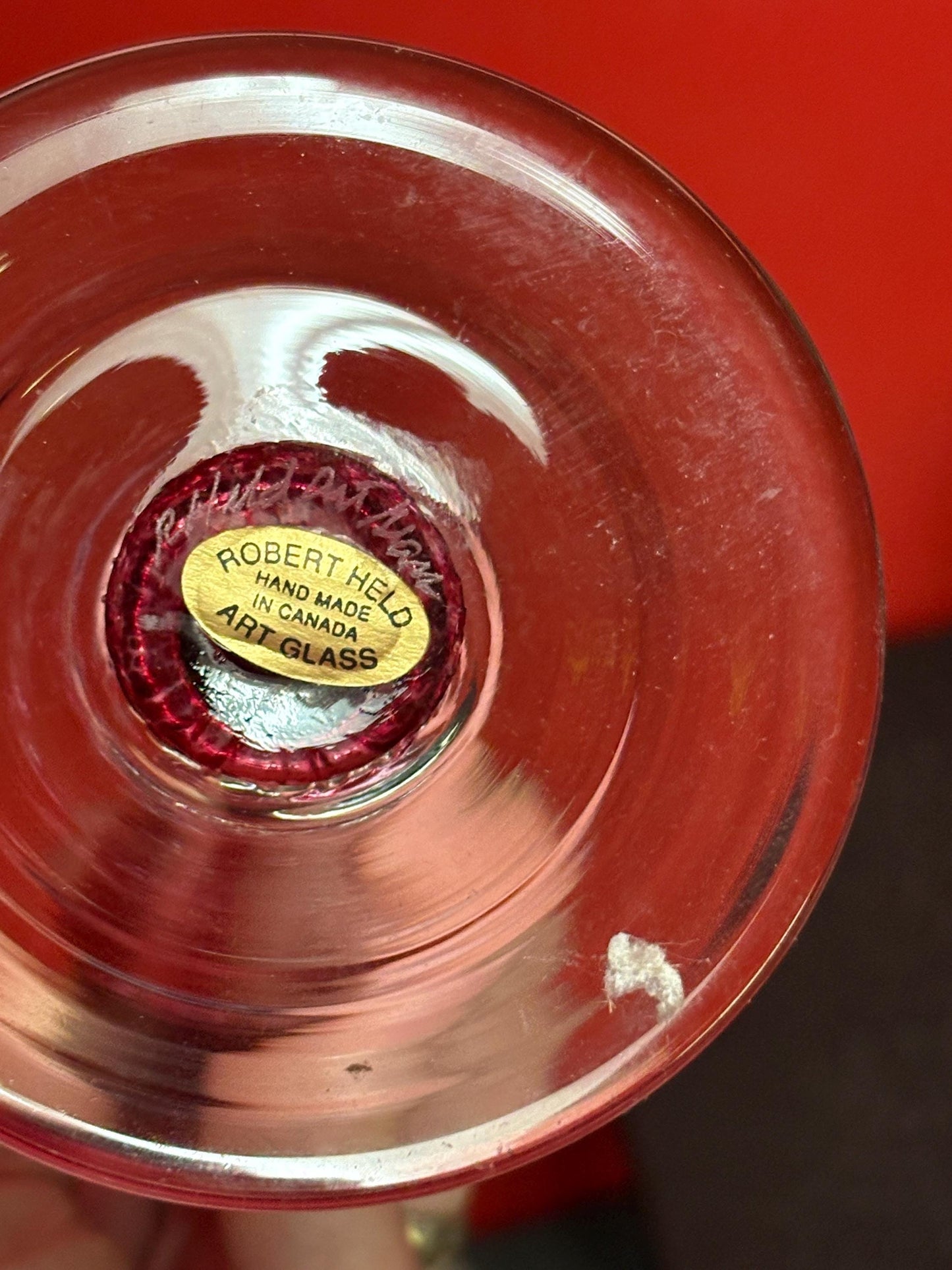 Robert held 10 inch Vancouver Island iridescent hand blown candlesticks  pair is in perfect condition