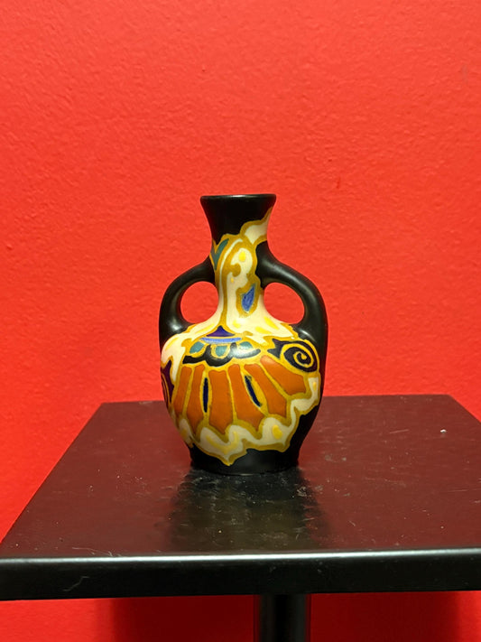 4 1/2 inch tall signed Gouda double handled vase  in great condition