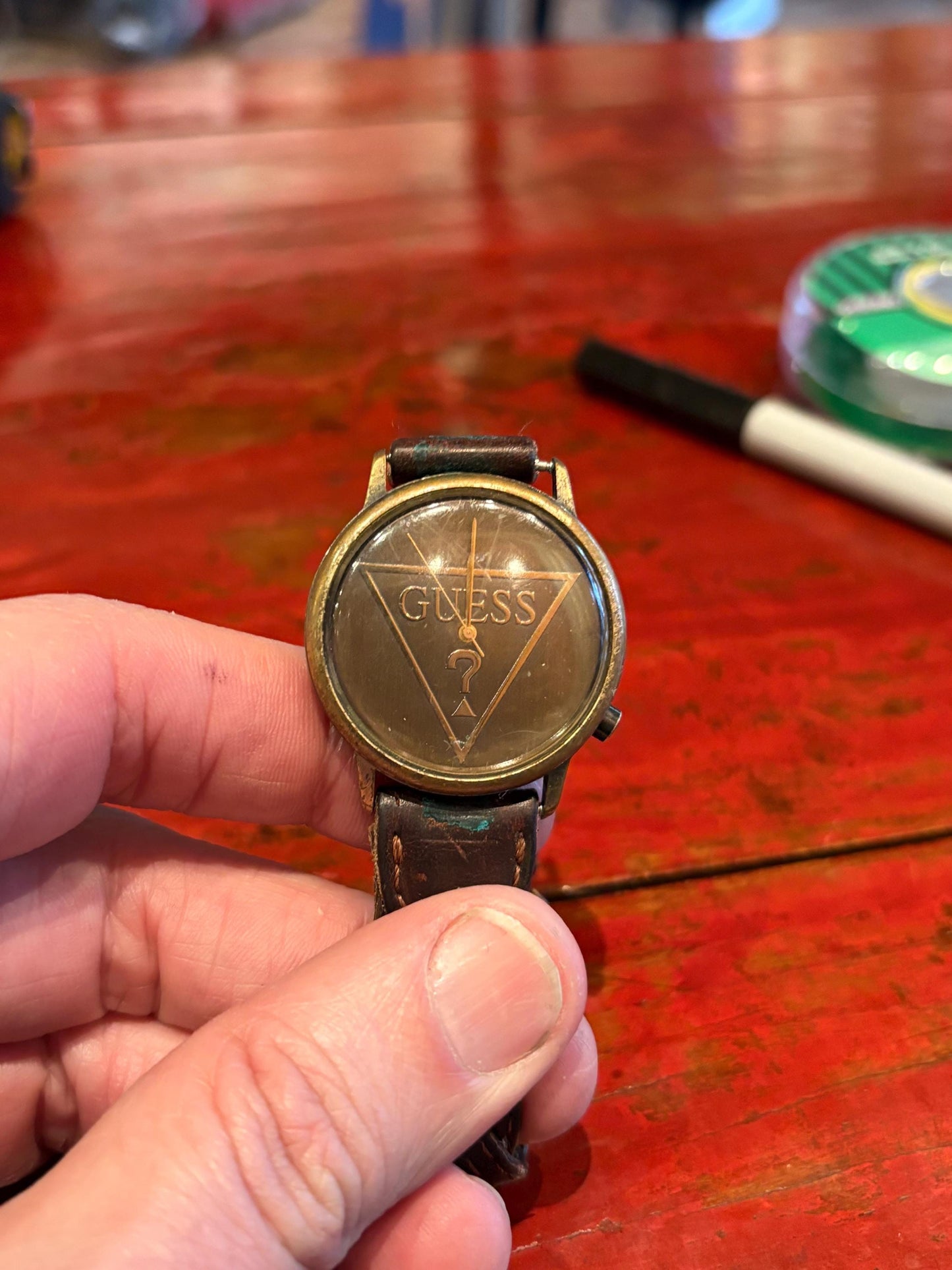 Very cool vintage GUESS watch with leather strap  9 inches long as is  needs battery   value priced
