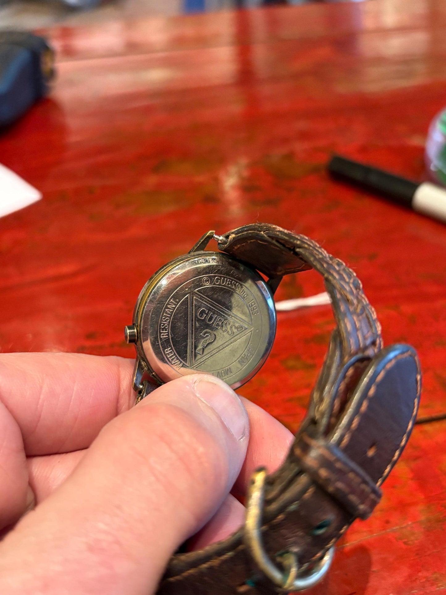 Very cool vintage GUESS watch with leather strap  9 inches long as is  needs battery   value priced